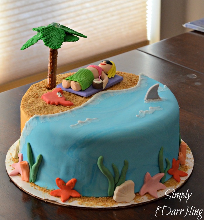 beach cake with palm tree, sea life and girl