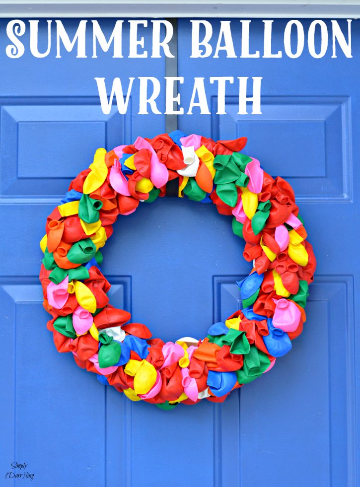 This fun and happy summer balloon wreath is the perfect item to adorn your front door! 