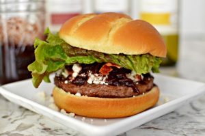 Burger with Red Wine & Date compote, bacon, and feta cheese
