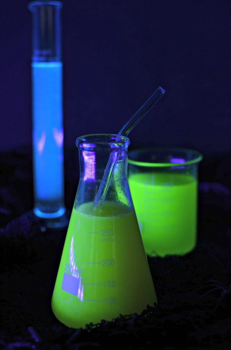 Halloween Cocktails That Glow In The Dark with a Black-light