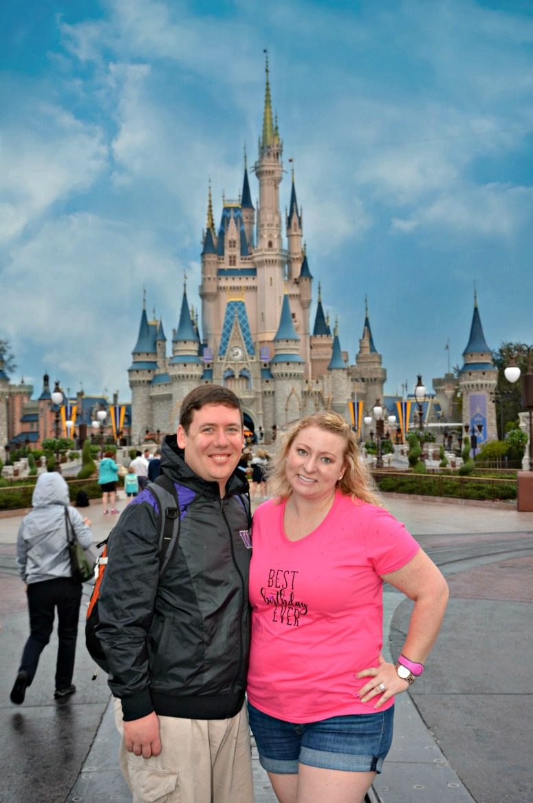 Couple in front of the castle at Walt Disney World Magic Kingdom