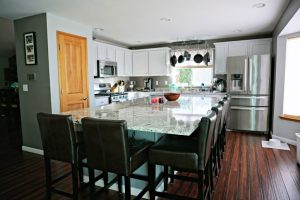 White Kitchen Cabinets with Granite and Large Center Island
