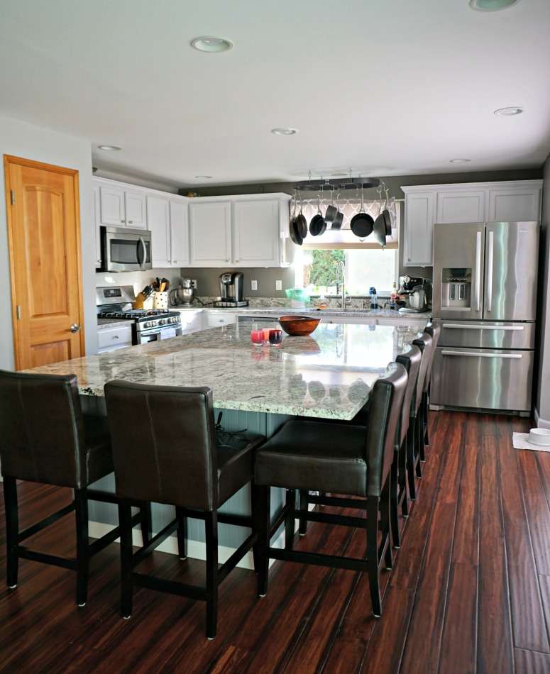 White Kitchen Cabinets with Granite and Large Center Island