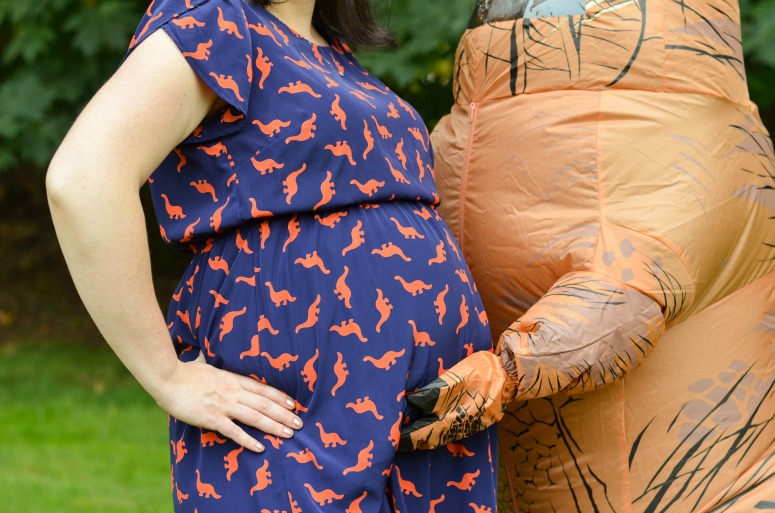 Maternity Photoshoot using Blow-up T-REX Costume
