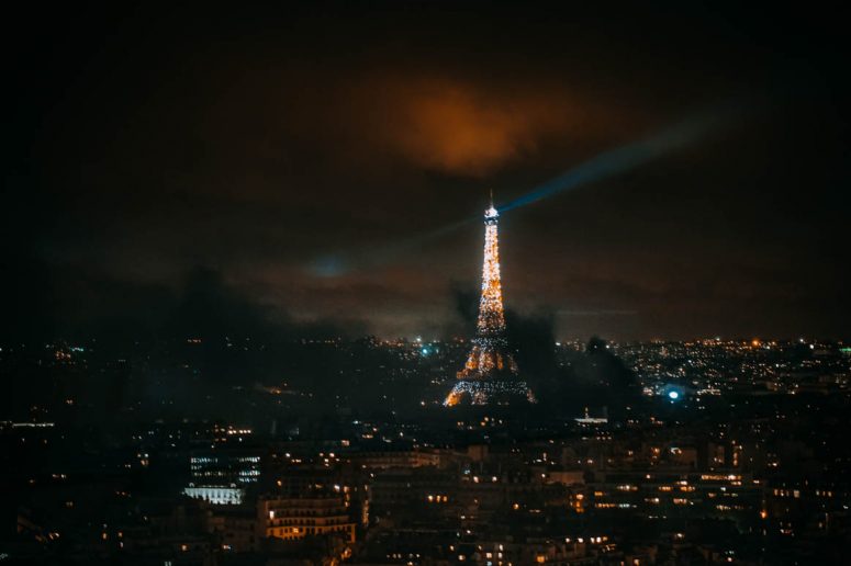 Eiffel Tower at Night - Yellow Vest Protest Smoke