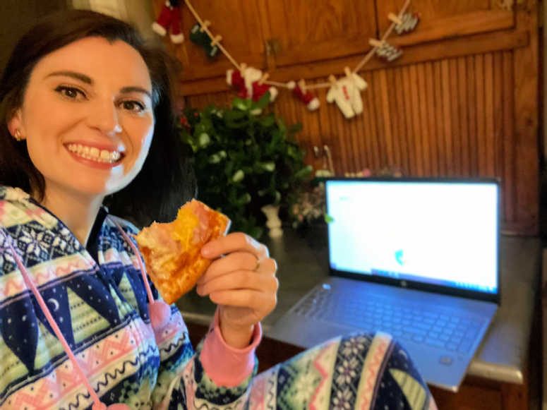 Woman eating Papa Murphy's Pizza