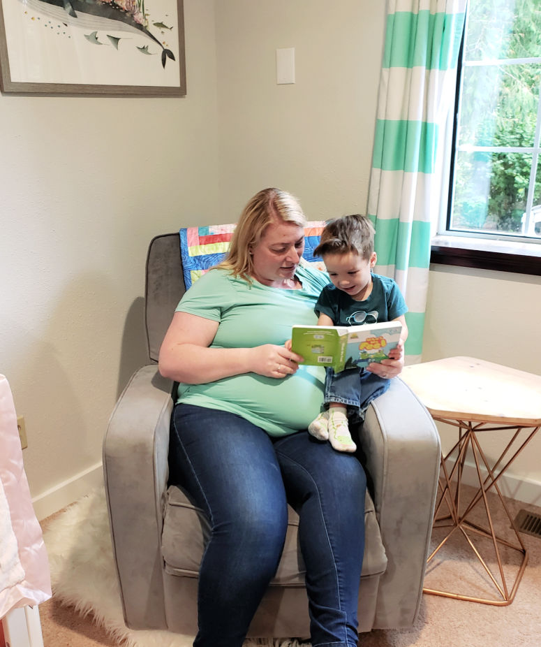 Mom and Toddler Reading in Nursery